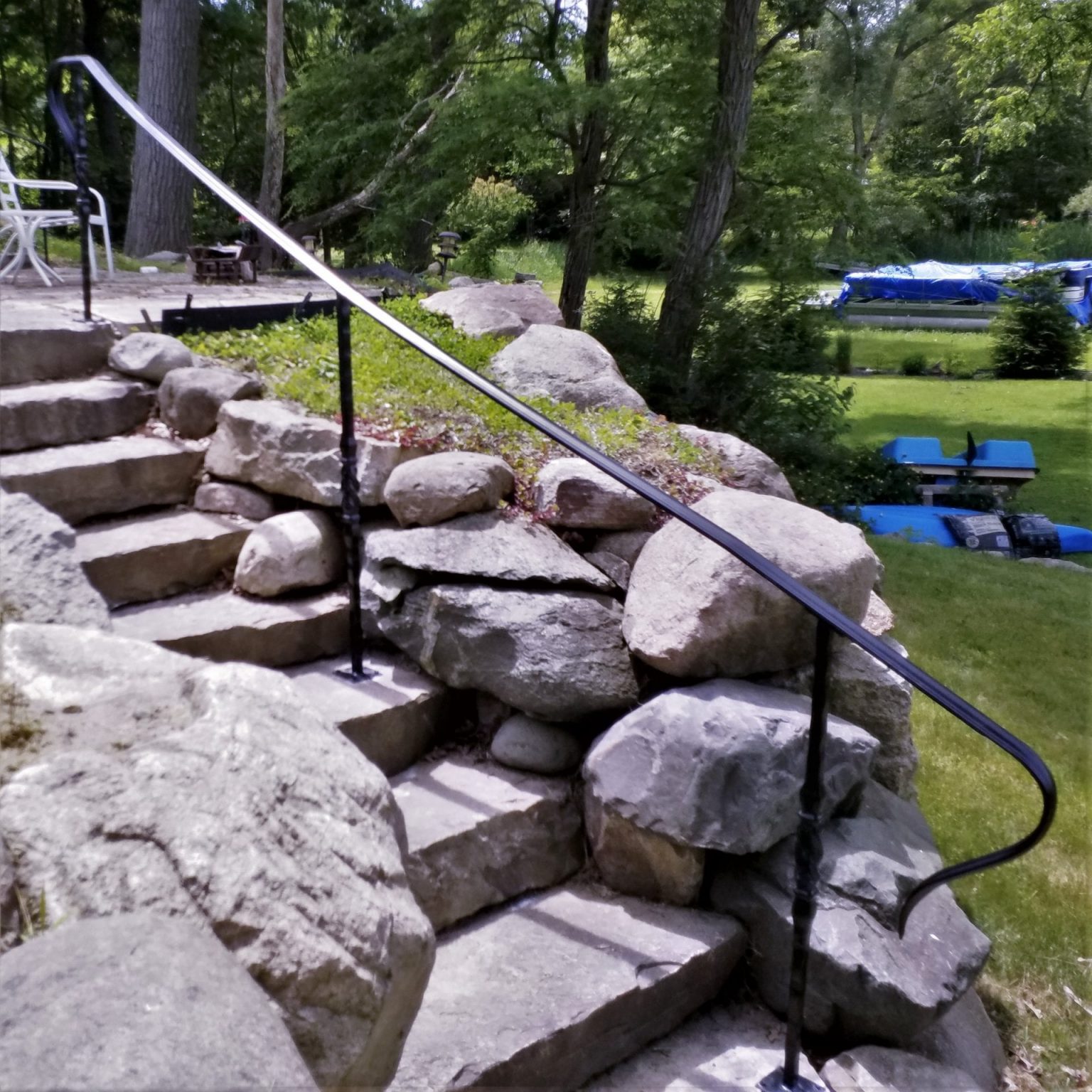 Decorative Wrought Iron Rail on Stone Steps - Great Lakes Metal Fabrication