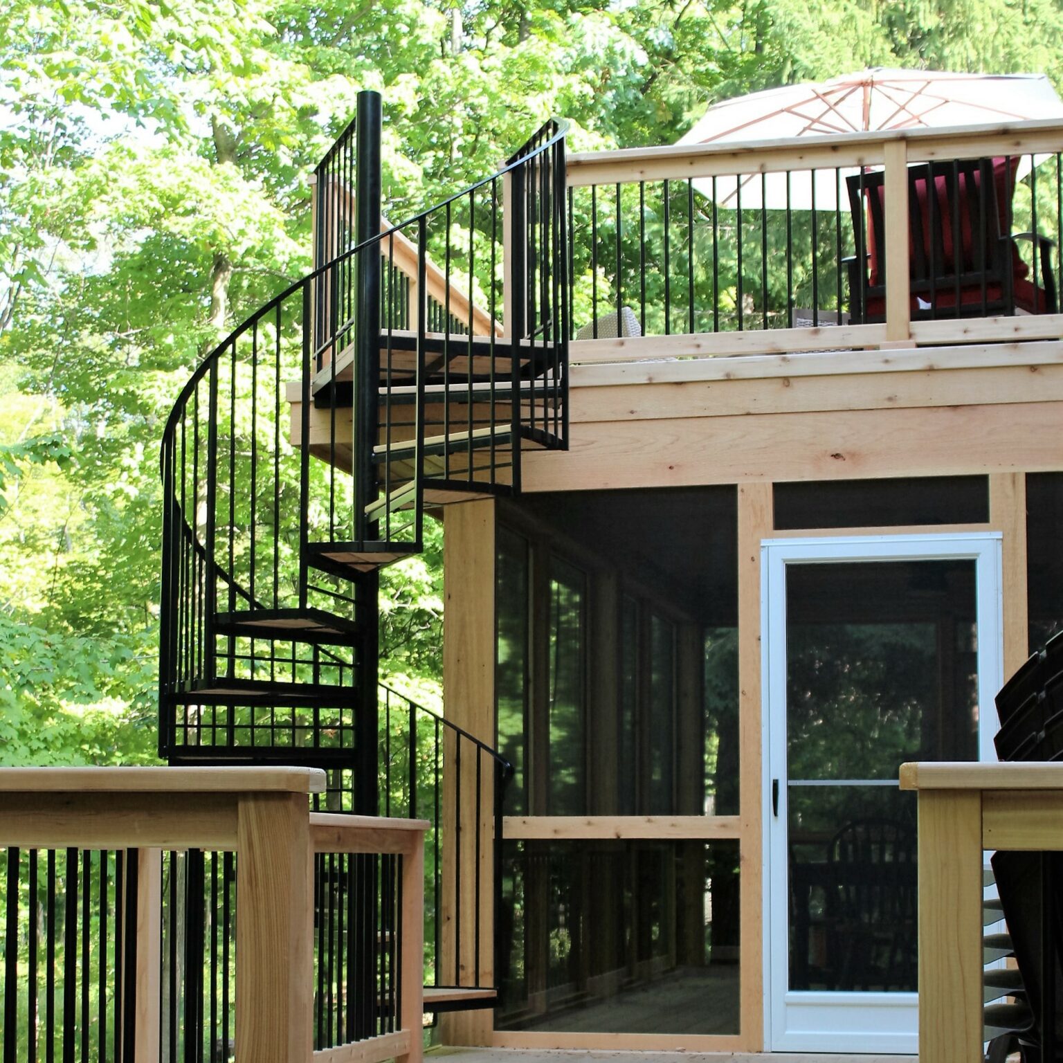 Cedar Deck and Spiral Staircase Great Lakes Metal Fabrication