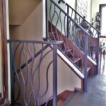 contemporary metal railing modern art nouveau stair rail with wall-mounted handrail